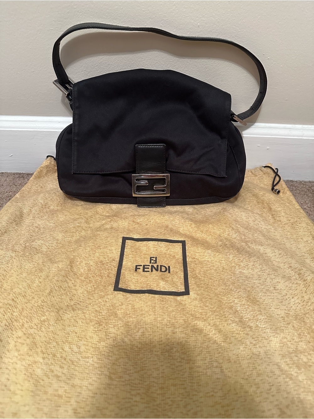 Fendi Mama baguette bag with metal tip Fendi drawstring dust bag